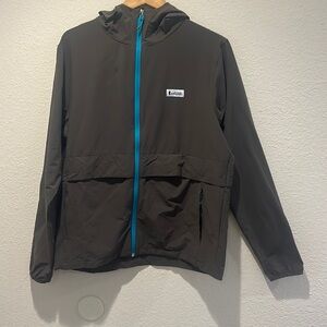 COTOPAXI TRAVEL JACKET BROWN WITH BRIGHT BLUE ZIPPER